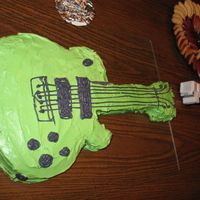 Gutiar Cake my sons third birthday cake. i should have used buttercream frosting instead of store bougth but he liked it so i was please. it was made...