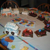 Train Cake my sons first birth day cake. i saw a picture in a book and gave it a try the one in the book was alot nicer i was please it was my first...