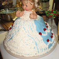 Blue Doll Cake my daughters third birthday cake she wanted a doll cake with a blue dress and she meant doll not barbie. it was way to much cake but she...