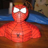 Spiderman Cake this is my sons fourth birthday cake he loves spiderman i got the idea from this web site. most people said that they used styrafoam wig...
