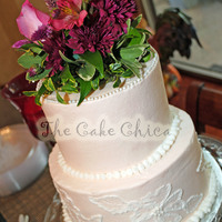 Cassie 8 inch and 6 inch round with fresh flowers.