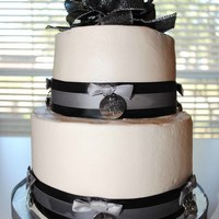 25Th Anniversary Cake 8 inch and 6 inch cake rounds. Dark Chocolate cake with Strawberry Filling.