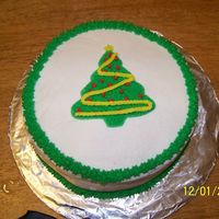 Christams Tree This was my very first decorated cake. It's not very good, but I am proud of it. I used a cookie cutter to make the outline and then...