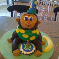 Monkey's 1St Birthday! 3-D Baby Monkey Cake. This picture was taken before the finishing ribbon was applied to the fondant covered base. This little monkey is...