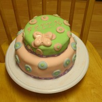 Faith's Cake #2 Hello. I posted the top layer earlier, but I am FINALLY through with the decorating. Wow, this is fun to do but SO much work! I love it,...