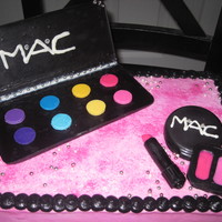 Mac Makeup I did this cake for a co-worker who loves mac makeup. This cake was alot of fun to do. All pieces are chocolate, and cake is covered in...