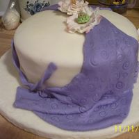 2008_142.jpg Wilton Fondant Class. This is my sample cake we made in class.