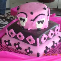 Pirate Princess Birthday Cake 3-tier fondant cake with pink and black color scheme--used skeleton cookie cutter to make faces and decorated with fondant and buttercream...