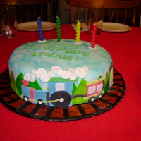 Train White cake with fondant decorations
