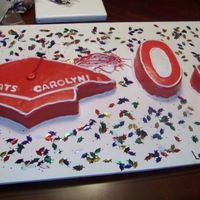 Graduation Cake. My very first one that I did with my friend. I think it's Marshmallow Fondant.