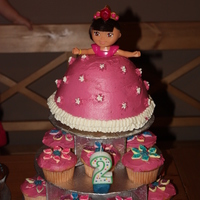 Dora Cake With Cupcakes WASC with buttercream frosting. Dora is a little doll.