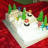My First Real Cake This was a cake I made for my sons Grade 3 Christmas dinner! it fed 50+ kids and they all came back for seconds!!! It was my first time...