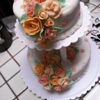 Course 3 Last Cake Fondant roses and Marshmallow Fondant on the Cake. Marshmallow fondant does not really make nice roses