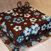 Big Flowers This cake was huge! Butter cream with fondant accents. Very boring square but she was happy as thats what she wanted! TFL