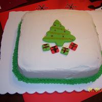 Christmas Cake Chocolate cake with buttercream. Fondant accents.