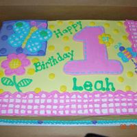 Hugs N Stitches Girls first birthday and I was given the theme to match. All BC icing