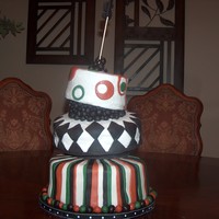 Ryan's Birthday Cake My first topsy-turvey cake for my son's 15th birthday. By far the most difficult cake I've made. My son insisted on buttercream...