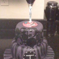 Birthday Cake Customer supplied the martini glass and this is what I came up with. I filled the glass with gelatin I colored purple. The strawberry is...