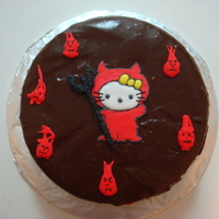 Devil Hello Kitty Cake Chocolate cake with fudge topping. decorations done in Royal icing.