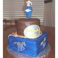 Cowboy Graduation Cake We put a Cowboy Twist on this High School Graduation cake. Everything is edible. The cake itself is two flavors. The bottom tier is...