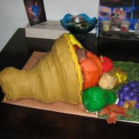 Cornucopia Cake This was actually our 2nd cake together for a Thanksgiving dinner we were going to. This puppy weighed a ton, and carrying it the 2 blocks...