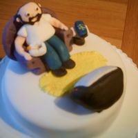 Male Retirement Retirement cake for a man who was interested in the TV remote, smoking and chilling out
