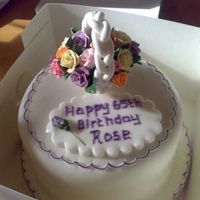 Flower Basket 65th birthday cake. basket of flowers