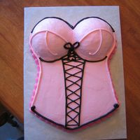 Bridal/lingerie Bustier Cake A 11x15 hand-carved sheet cake with half ball pan for bust. Iced with buttercream, with black accents. Inspired by a cookie I saw on CC.