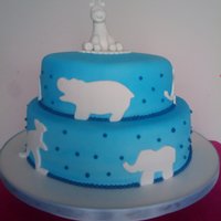 Baby Giraffe, Blue & White Babyshower Cake 2tier (8inch red velvet cake, vanilla filling, 10in white cake, strawberry mousse filling)Jungle animals silhoutte along side of both tiers...