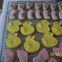 Baby Shower first cookies. Cookies covered in fondant with royal icing accents.