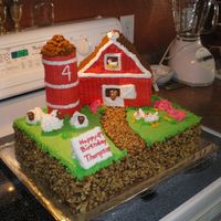 Barn Cake I am so proud of this cake I have other pictures of just the animals. Everything was piped and I used no special pans. The silo is cookies...