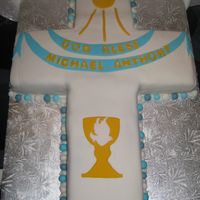 First Communion Cake White cake with ferrero rocher filling and all fondant decorationsthis was a huge project to tackle ......the board measured 2feet x...