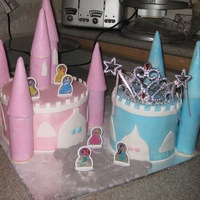 Disney Princess Theme Cake yellow cake filled with nutella buttercream covered in fondant...the picture is not the greatest but the front shows a cobble stone path...