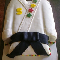 Tae Kwon Do Birthday Cake for my nephew's 5th birthday. Chocolate cake w/ oreo buttercream. I had several tears in th sides, I was rushing quite a bit, but...