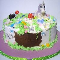 Unicorn Cake Yellow butter cake with lemon curd filling and covered with butter cream . Hand modeled unicorn, mushrooms and flowers are made with...