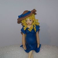 100_0445.jpg I put the wrong arms on this doll.....I fixed her, I named her Preggers and she is waiting for her love seat ;-)