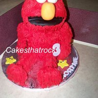 Elmo Birthday Cake Elmo is made from pound cake. Eyes, nose, arms and legs are rice treats. Butter creamwith fondant accents. Made for my daughters 3rd...