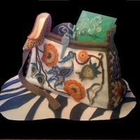 Debbie's Birthday For our sister's birthday. The purse was filled with things she loves, and on a zebra skin rug. It was the image of her favorite purse...