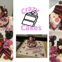 Minnie Mouse missing slice cake with fondant strawberries and hand sculpted minnie mouse - no molds!Chocolate cake with strawberry buttercream...
