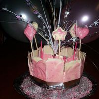 Auntie's Birthday Cake My auntie wanted a real pink sparkly cake, i came up with this :) I used chocolate shards, pink ganache, lots of silver and pink...