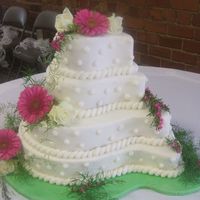Gerber Daisy Paisley Cake White cake with buttercream icing.Real flowers.Board covered in fondant.