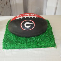 Ga Bulldogs GA Bulldogs grooms cake. Chocolate chip amaretto poundcake with buttercream filling and Satin Ice Fondant. This is sitting on a marble...
