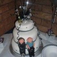 25Th Wedding Anniversary Modelled couple on black and white cake with beer keg and jewel spray