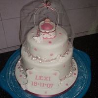 Christening Cakes - Girls White and pink jewelled christening cake for a girl with cradle, baby and netting