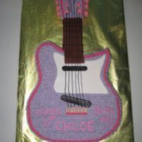 Hannah Montana Guitar Cake buttercream frosting and MMF