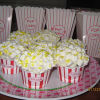 Popcorn Cupcakes Popcorn cupcakes with marshmallows topping (use yellow food coloring)