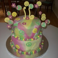 Tie Dye Sweet 16 Cake i realized after i finished the cake the the peace signs weren't right, but the birthday girl still loved the cake!