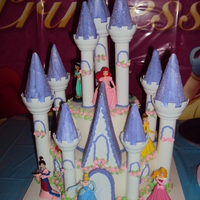 Princess Birthday Cake This was the cake for my daughter's 4th birthday party. It was a two tier chocolate and vanilla cake with butter cream icing. I did it...