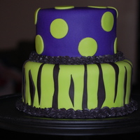 Shelby All done in fondant. Made fondant plaque w/ HB and highlighted with silver luster dust. I forgot to take that picture.