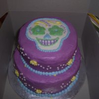 Emma's Skull Birthday Cake Day of the dead-esque birthday cake for my 10 yr old, she likes bright colors and skulls and gave me free reign over her birthday cake, so...